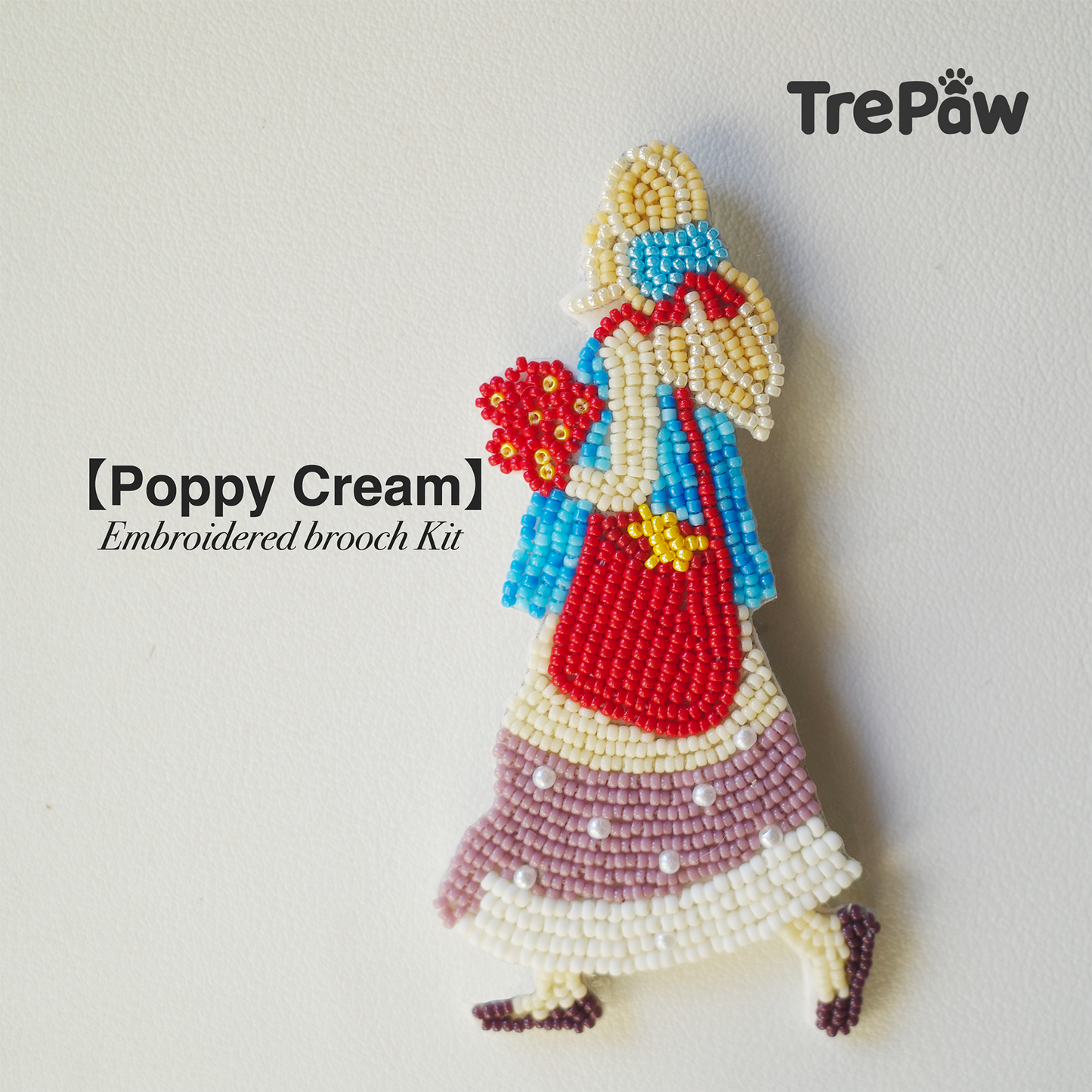 Poppy Cream DIY bead embroidery kit featuring a girl with a ribbon in her hair holding a bouquet of red flowers