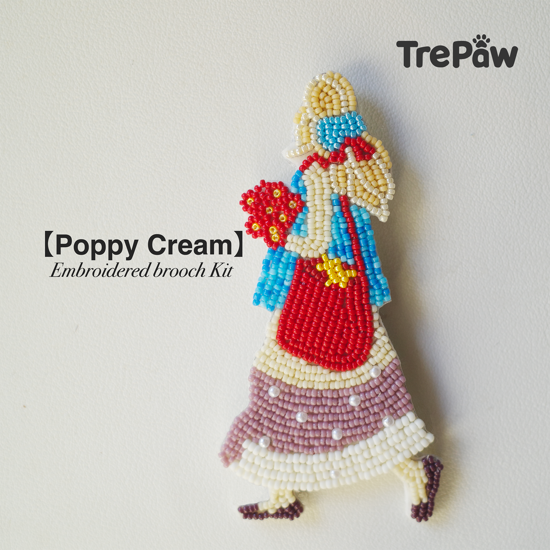Poppy Cream DIY bead embroidery kit featuring a girl with a ribbon in her hair holding a bouquet of red flowers