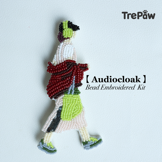 Audiocloak DIY bead embroidery kit featuring a girl with headphones walking in a red skirt