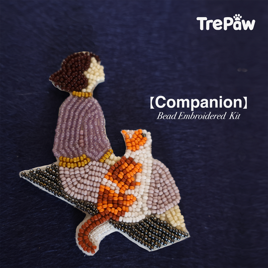 Companion DIY cat bead embroidery kit featuring a girl sitting with her cat