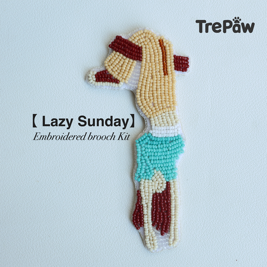 Lazy Sunday DIY bead embroidery kit featuring a girl hanging upside down