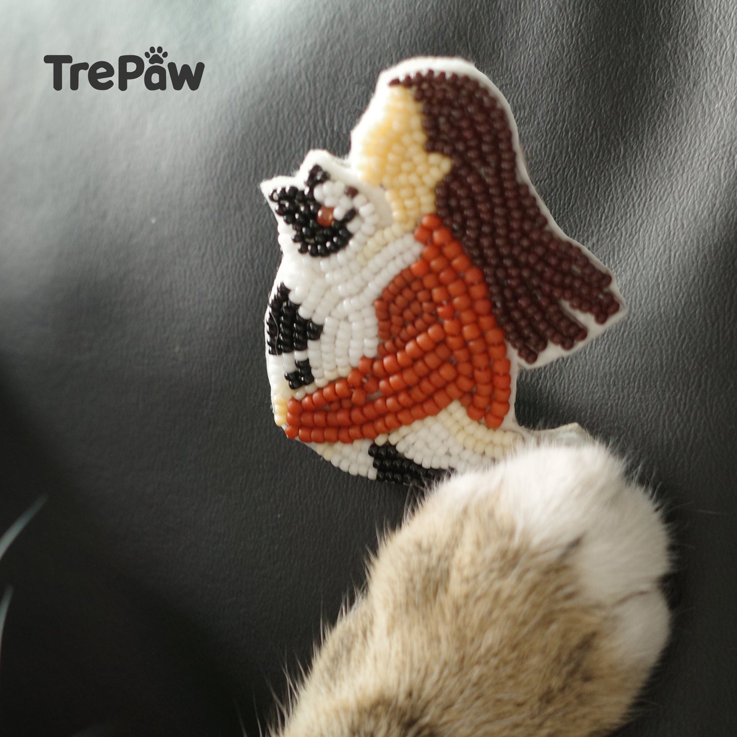 Sunset Mew beaded brooch displayed as home decor - handcrafted piece to add warmth and tenderness to any room