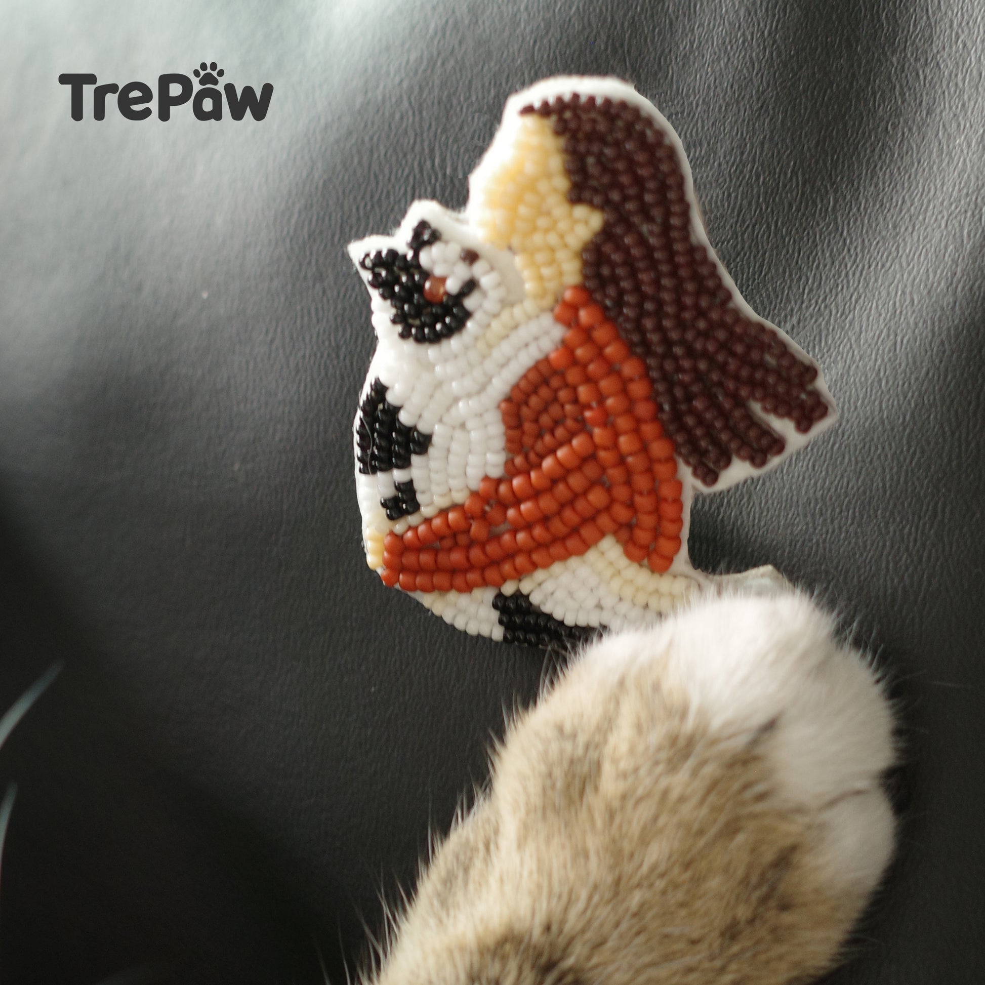 Sunset Mew beaded brooch displayed as home decor - handcrafted piece to add warmth and tenderness to any room