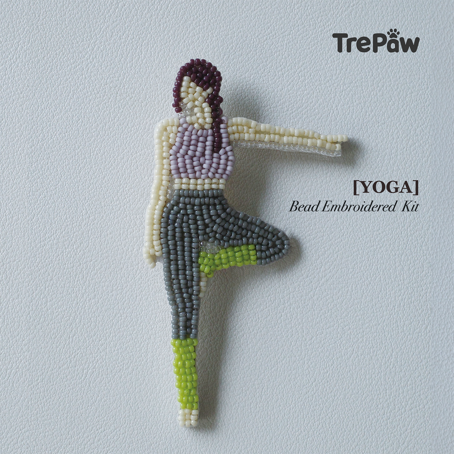 Yoga handmade bead embroidery brooch featuring a girl in a yoga pose
